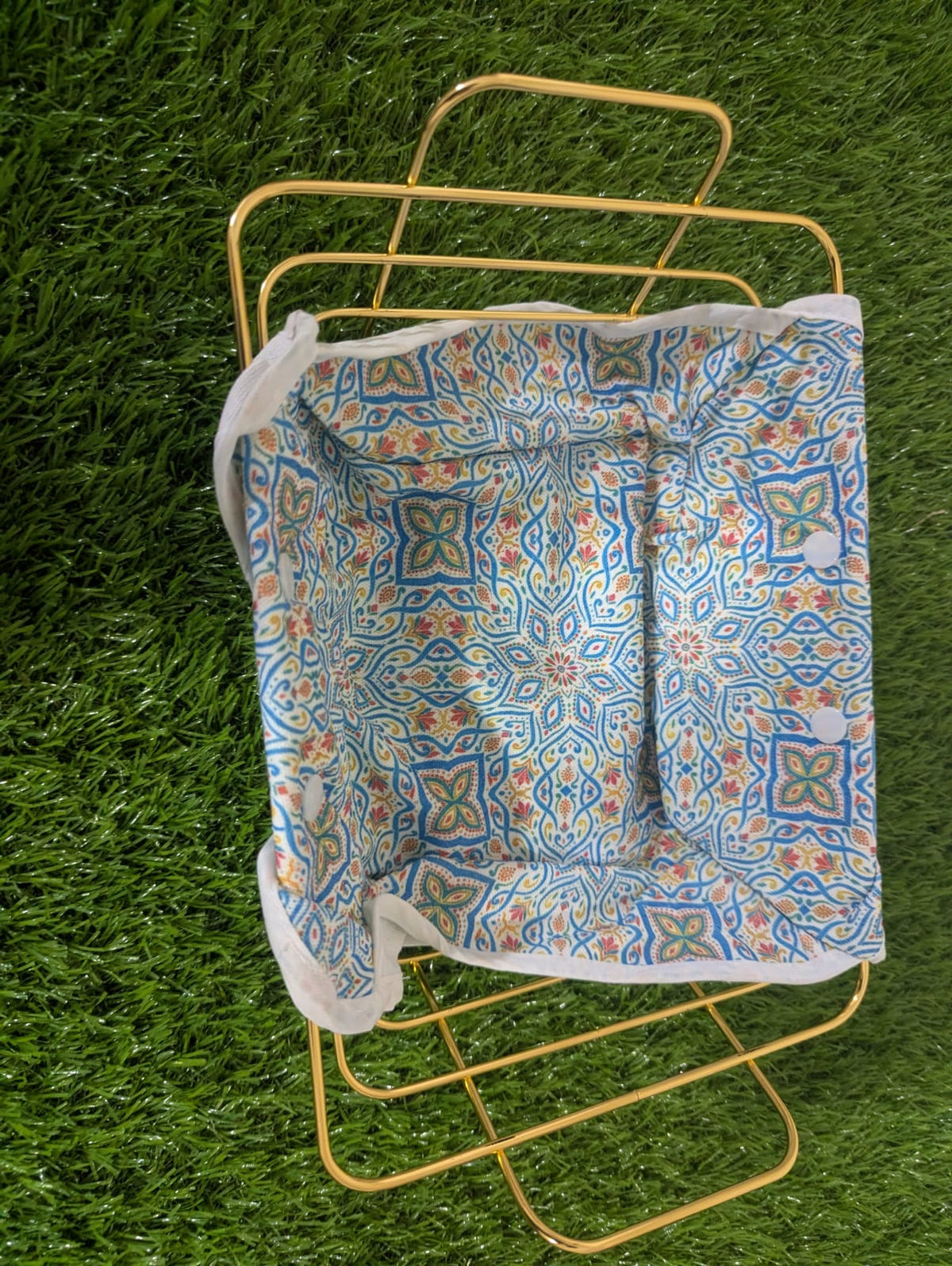Rectangular gold wire bread serving basket with printed fabric