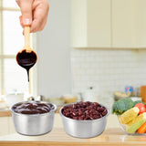 Colorful silicone lids on reusable mini steel bowls for sauces and dips
